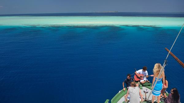 group of friends on a cruise in the Maldives