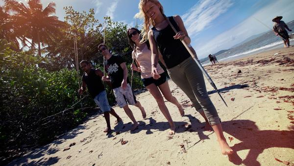 travellers spear fishing in Bama Way, Queensland, Australia